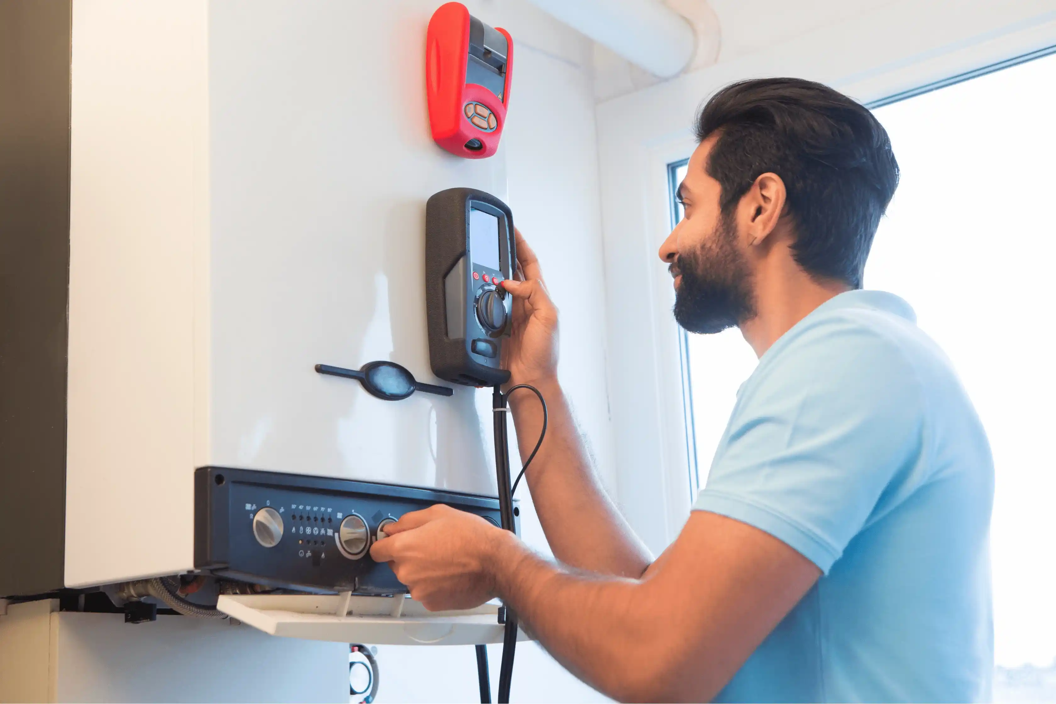 Homeowner Checking Central Heating Temperature